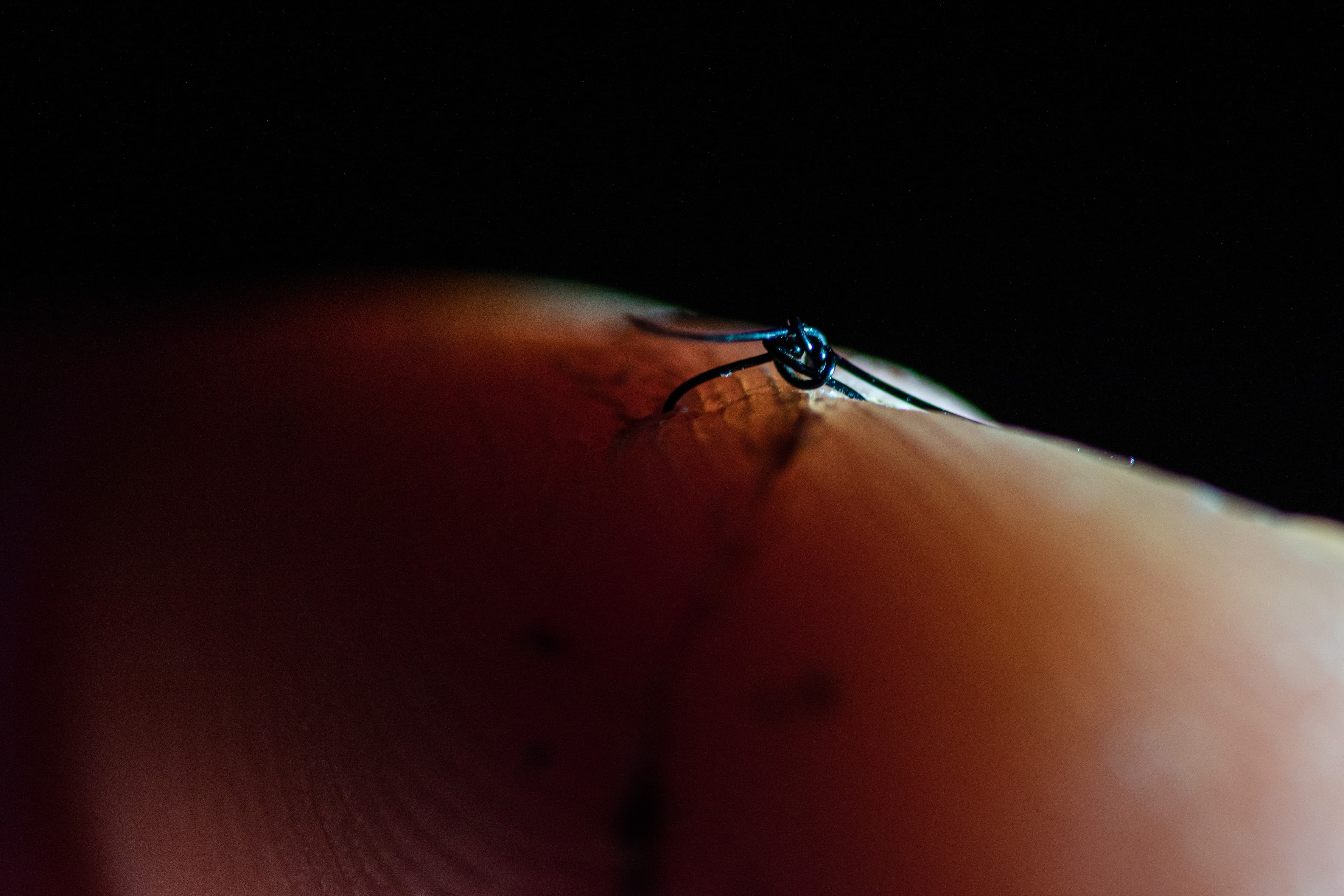 A single stitch on a finger